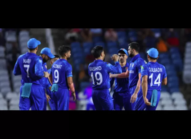 Afghanistan advances to Super 8 round in T20 World Cup after defeating PNG.