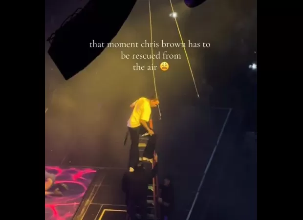 Chris Brown has an outburst onstage when he becomes stuck in the air during a performance.
