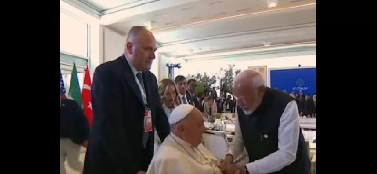 Indian Prime Minister Modi and Pope Francis have a meeting during the G7 Summit Outreach session.