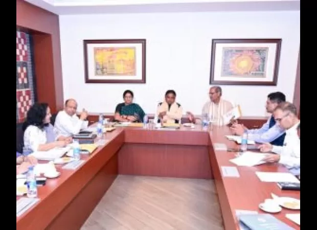 Mohan Majhi leads meeting review.