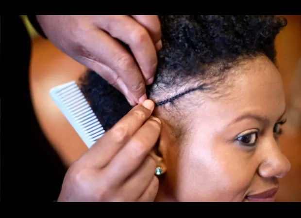 Detroit salon owner invents first dictionary for natural hair, an essential guide for people with curly hair.