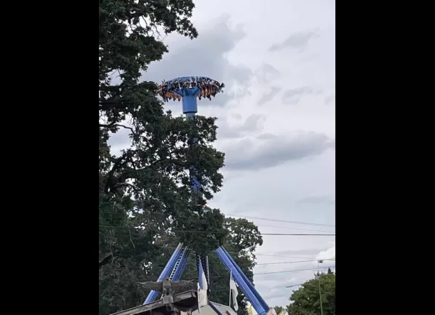 Rescue team saves 30 individuals stuck upside down on a US amusement park ride.