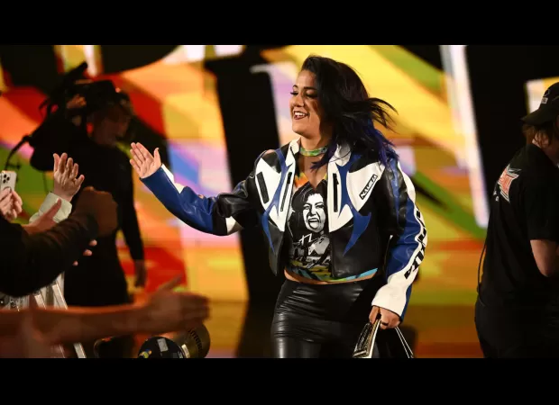 WWE wrestler emotionally overwhelmed backstage after feeling defeated and drained.