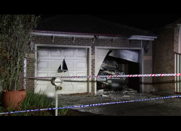 Two garages in Melbourne's west were victims of possible arson incidents.