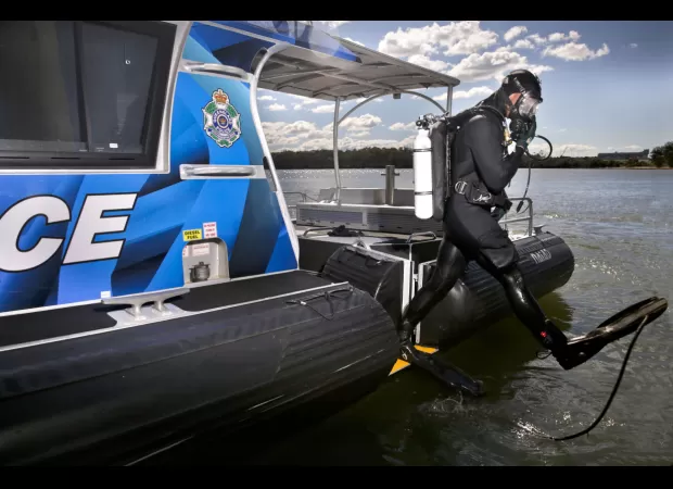 Authorities are looking for a man who went missing when his boat flipped over off the coast of Queensland.