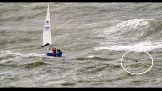 Two boats collided and a sailor was thrown into the water in a terrifying accident.