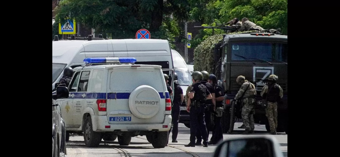 Russian troops raid jail to free captured workers, eliminating captors.