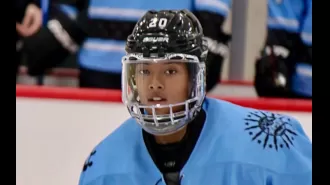 Trailblazing Black woman joins National Women's Hockey League, advocates for inclusivity.