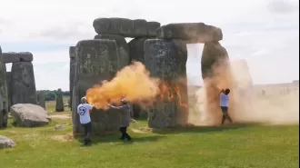 Spray-painted orange on Stonehenge.