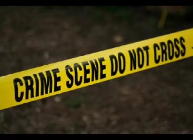 A man was found dead in a food joint in Delhi with a bus ticket and charger in his pocket, leading police to suspect a possible gang war.