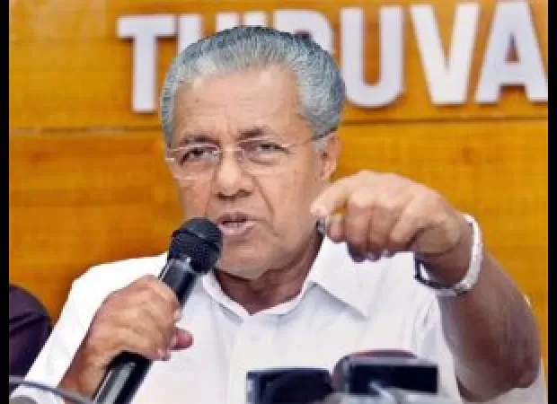 Kerala CM requests PM Modi's help after state health minister is denied permission for Kuwait fire response.