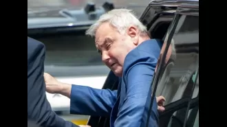 Eamonn Holmes, 64, is seen using crutches to help him walk due to health issues.