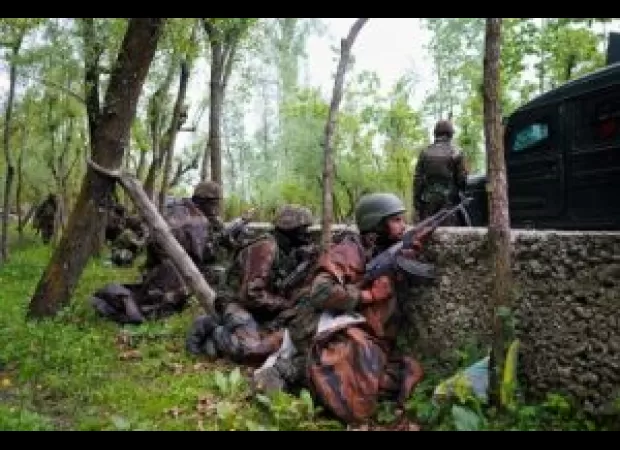 Two militants dead in J&K clash, two troops hurt.