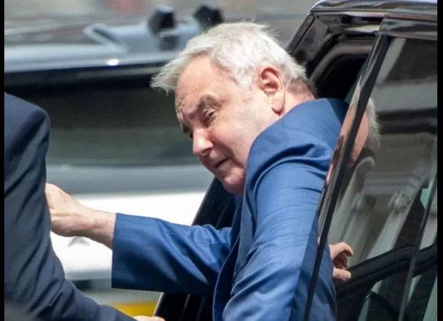 Eamonn Holmes, 64, is seen using crutches to help him walk due to health issues.