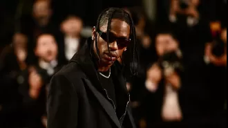Rapper Travis Scott charged with disorderly intoxication and trespassing.