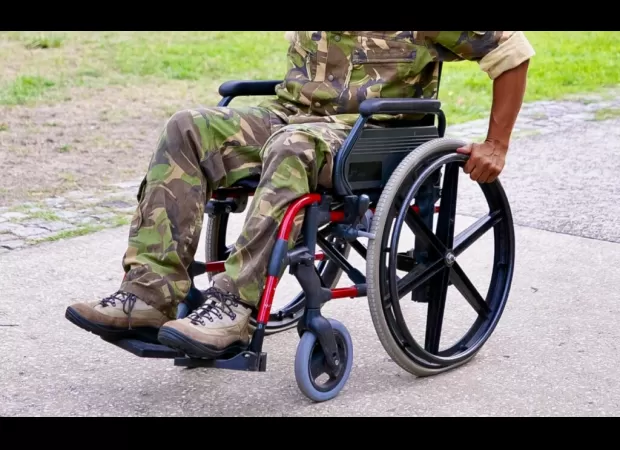 An ex-soldier is accused of pretending to be paralyzed in order to receive over $750K in benefits.