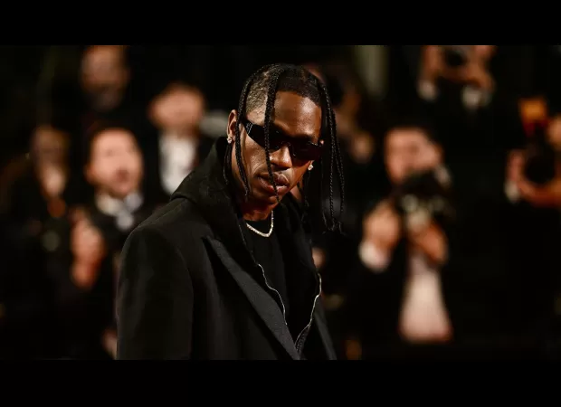 Rapper Travis Scott charged with disorderly intoxication and trespassing.