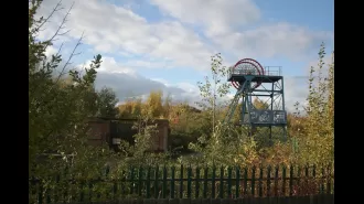 Abandoned amusement park with top log flume, locals plead for it to be restored.