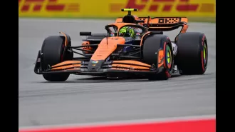 Norris secures top spot in Spanish GP qualifying after McLaren's motorhome catches fire earlier in the day.