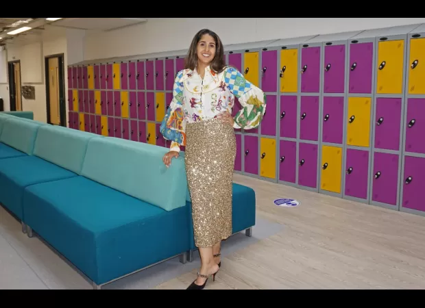 Earning £14,200 from renting out clothes to strangers.