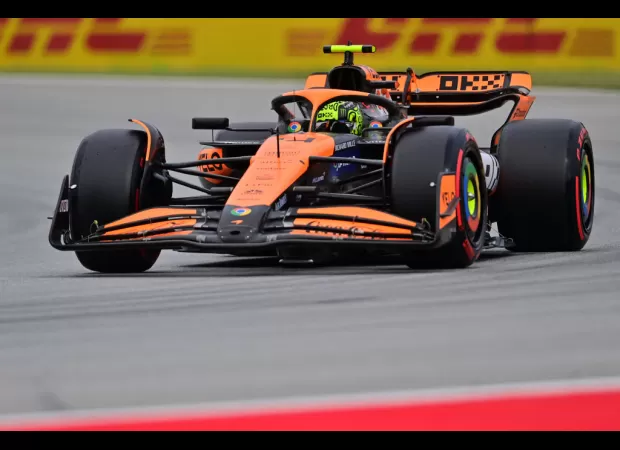 Norris secures top spot in Spanish GP qualifying after McLaren's motorhome catches fire earlier in the day.