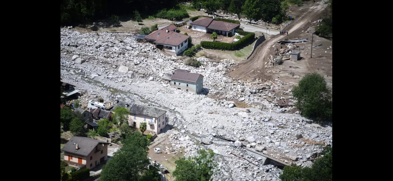Three people unaccounted for as massive landslide hits Swiss mountain town.