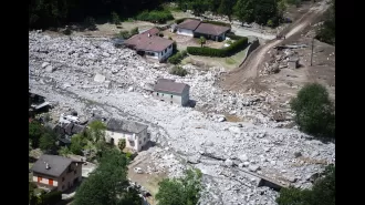 Three people unaccounted for as massive landslide hits Swiss mountain town.