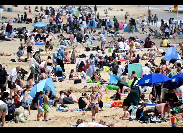 When will the UK's first summer heatwave be interrupted by thunderstorms?