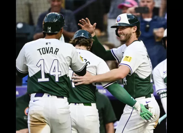The Rockies win with a walk-off walk, beating the Nationals in a comeback.