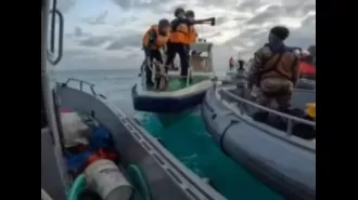 The Philippines stands its ground but does not intend to initiate a conflict following a clash with the Chinese Coast Guard.