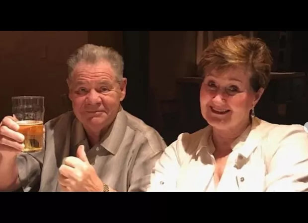 Famous 70s vocalist weds partner of 47 years.