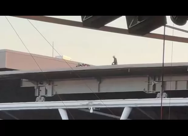 Fans at Taylor Swift concert shocked by mysterious figures on Wembley Stadium roof.