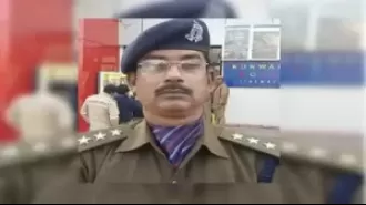 Police officer loses rank for being caught with colleague in hotel room.