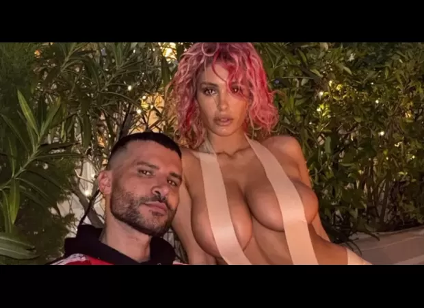 Kanye's wife Bianca Censori has a wardrobe mishap in a revealing tape outfit.