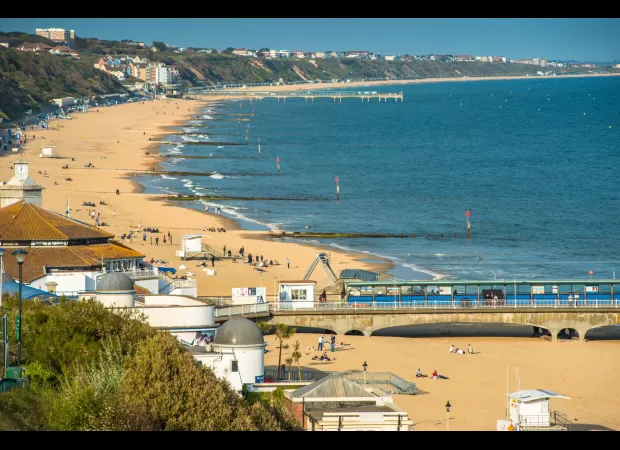 Authorities are urgently looking for a man who has gone missing in the sea at Bournemouth beach.