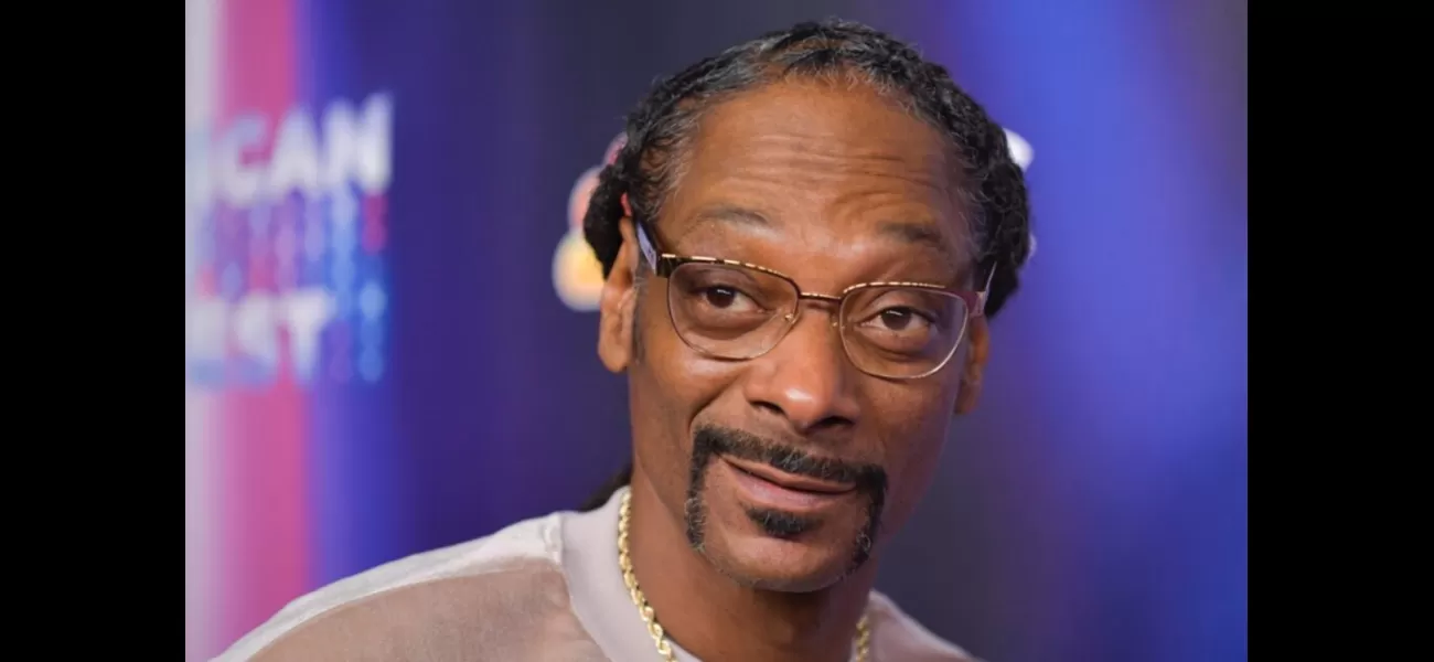 Snoop Dogg competes in 200m race at U.S. Olympic Team trials for track and field.
