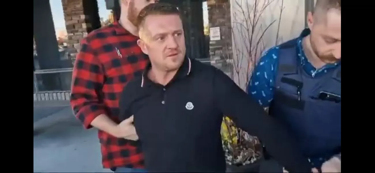 Tommy Robinson arrested for suspected immigration violation, taken away in handcuffs.