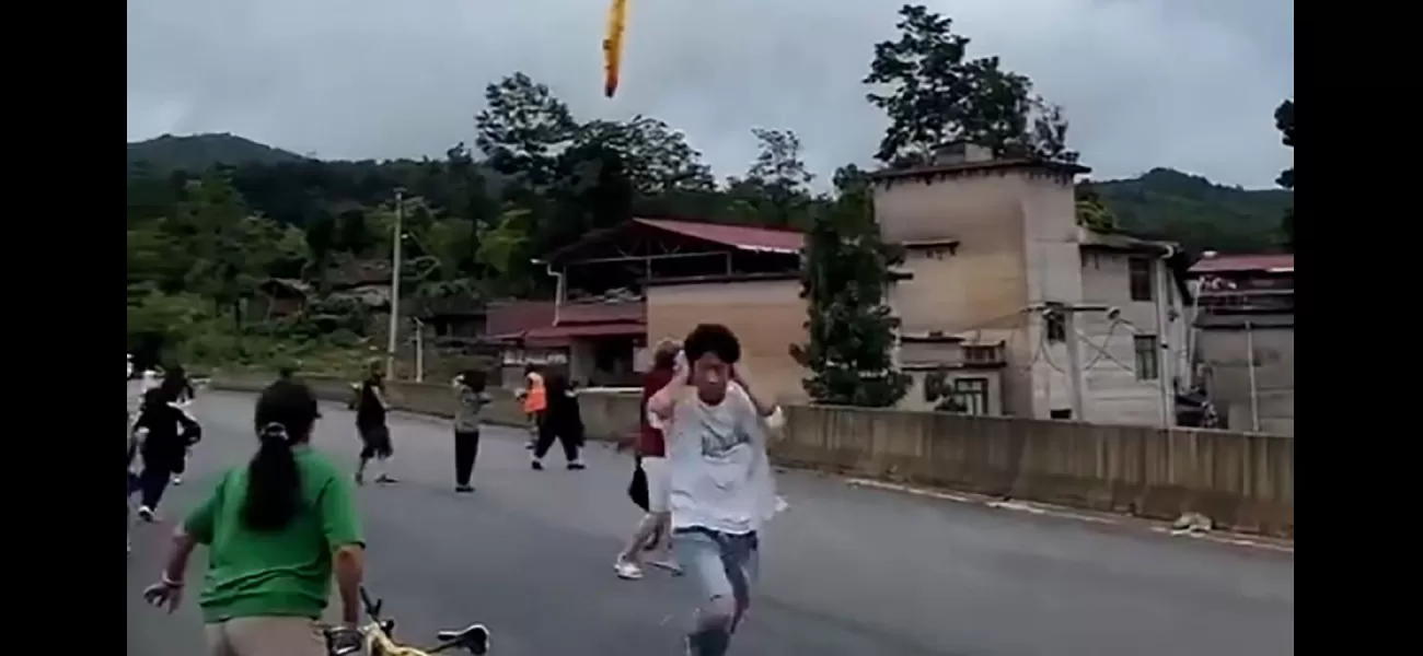 Reported footage displays dropping of suspected rocket debris over village in China