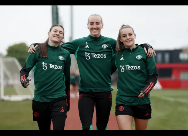 Manchester United relocates women's team to make room for men's squad in training facility.