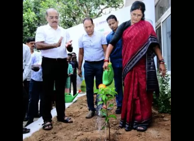 Parida, Deputy CM, plants tree at Tourism department.
