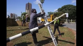 Kenya begins clean-up after deadly protests, with heavy police presence.