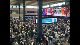 Hottest day of the year causes chaos at major London station due to travel disruptions.