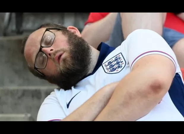 Sleeping England fan takes a jab at Gareth Southgate after uneventful Euro 2024 match.