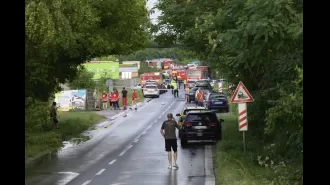 Slovakia bus collides with train, splitting vehicle in half.