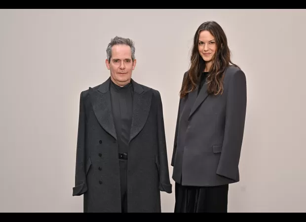 British actor Tom Hollander, age 56, sports unique outfit without using his hands while attending an event with his 40-year-old fiancée Fran Hickman.