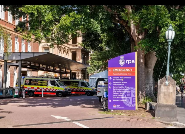 Man critically hurt on Sydney footpath, in hospital.