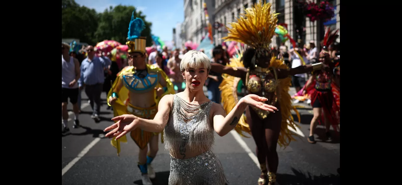 Tens of thousands march in London for annual Pride celebration.