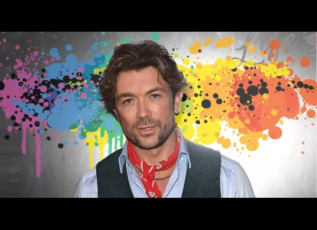 Actor Emrhys Cooper struggled with his homosexuality and self-destructive behavior before finding happiness in his identity.