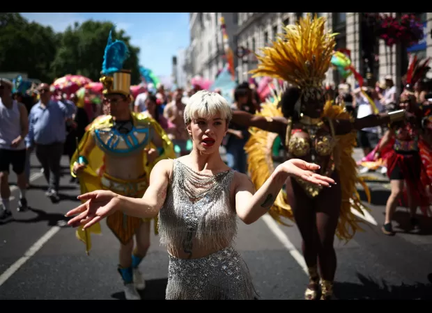 Tens of thousands march in London for annual Pride celebration.