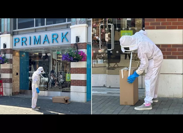 Bee swarm invades busy shopping street, causing chaos for customers.